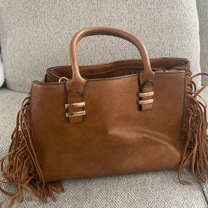 Tan, western style fringe purse. Perfect condition.